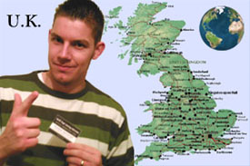 Richard Gottfried posing with his official membership card beside Great Britain